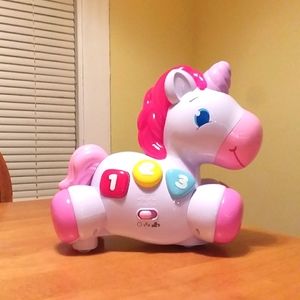 Unicorn Baby Toy Bright Starts Rock & Glow